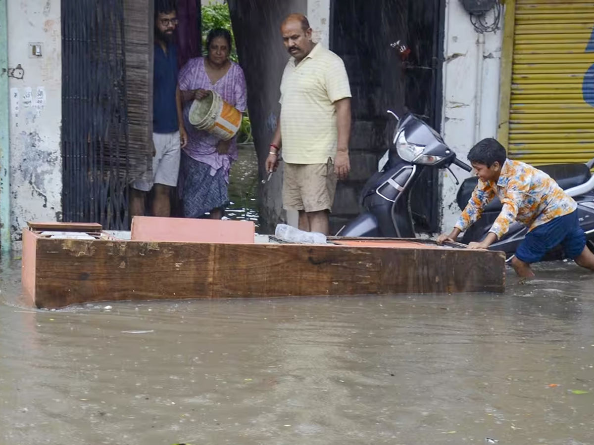 Heavy Rainfall Lashes Northern India Photo Gallery - Sakshi13