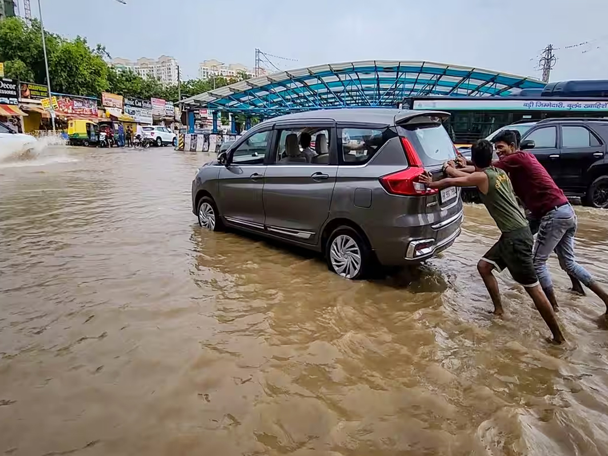 Heavy Rainfall Lashes Northern India Photo Gallery - Sakshi12