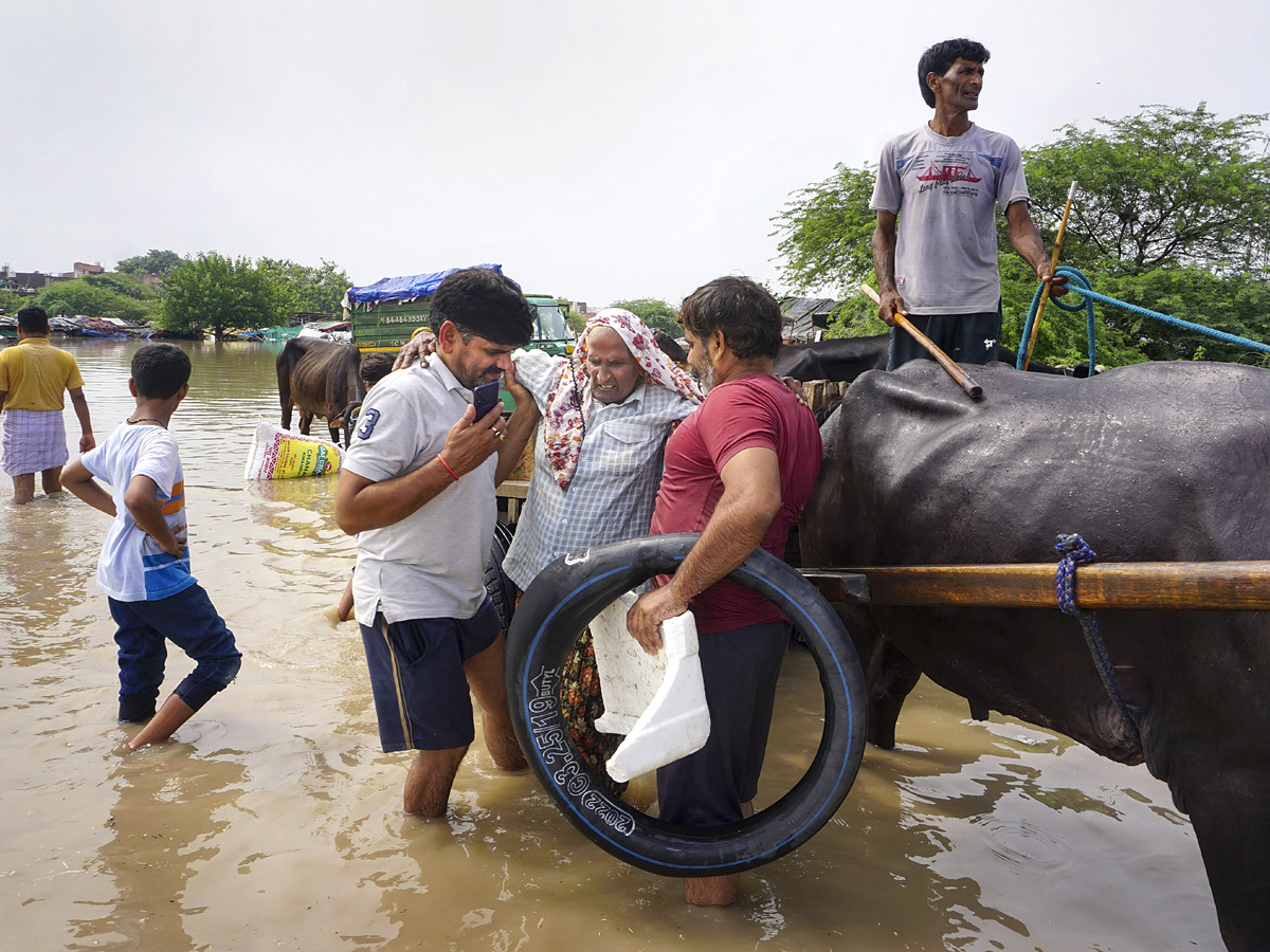 Yamuna Breaches Danger Level Waterlogging in Parts of Delhi Photos - Sakshi10