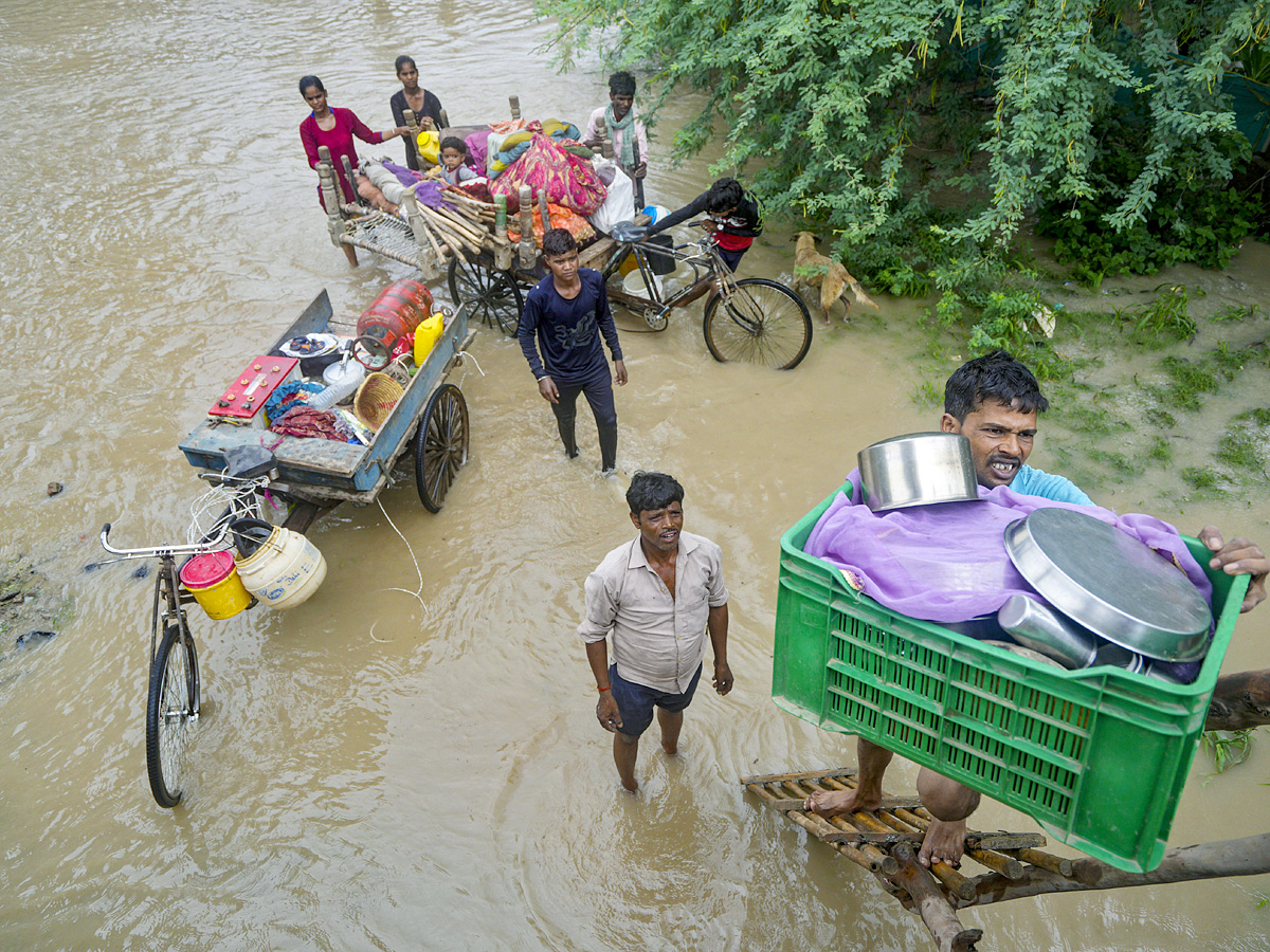 Yamuna Breaches Danger Level Waterlogging in Parts of Delhi Photos - Sakshi11