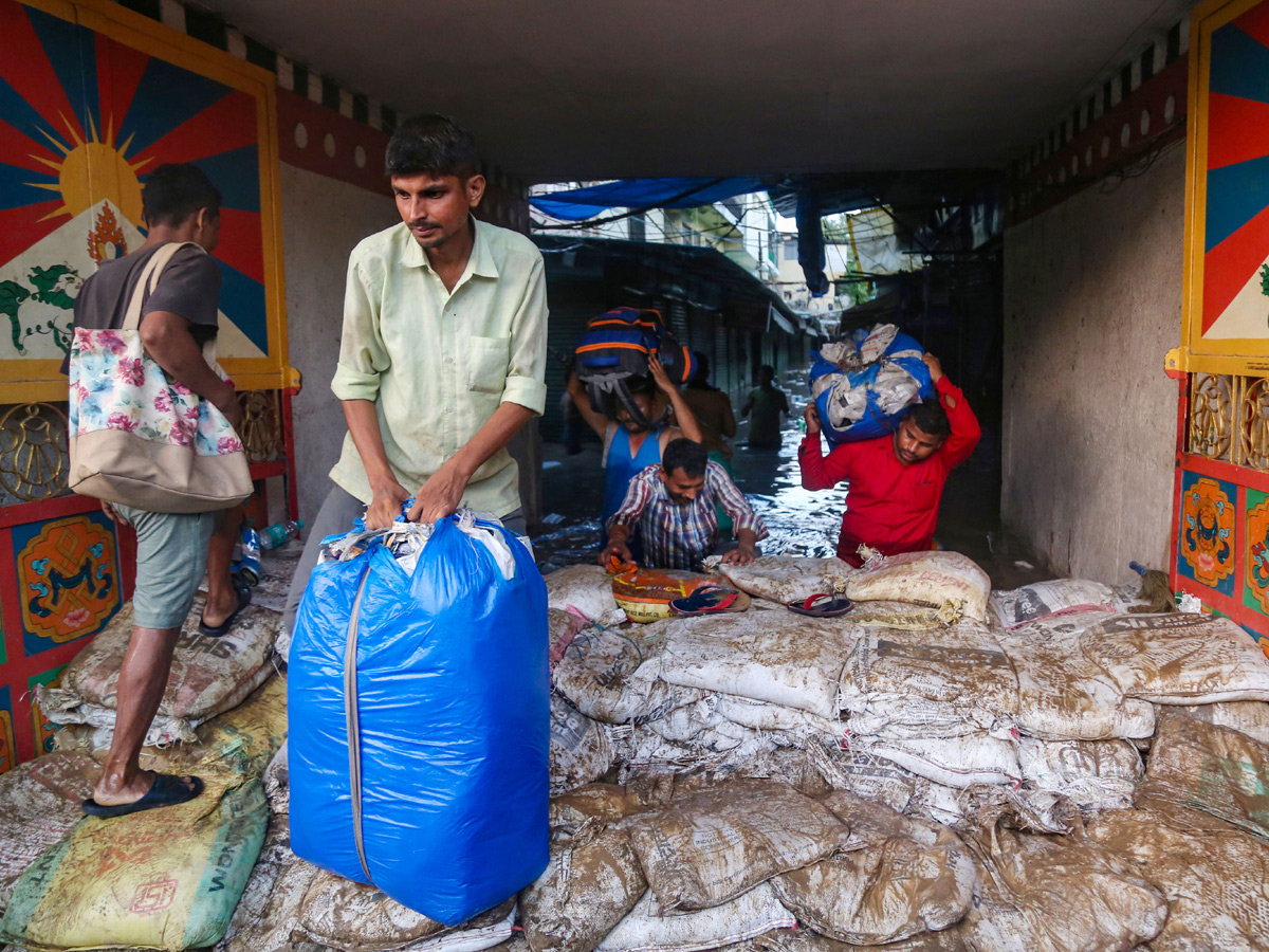 Yamuna Breaches Danger Level Waterlogging in Parts of Delhi Photos - Sakshi15