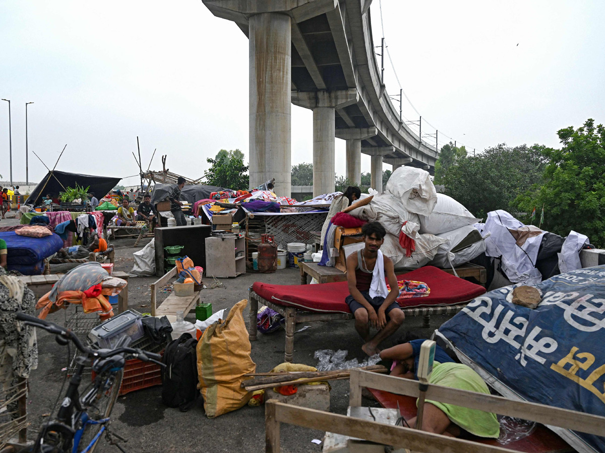 Yamuna Breaches Danger Level Waterlogging in Parts of Delhi Photos - Sakshi17