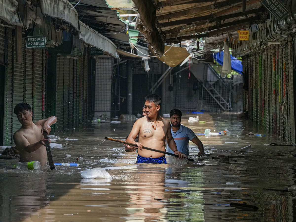 Yamuna Breaches Danger Level Waterlogging in Parts of Delhi Photos - Sakshi18