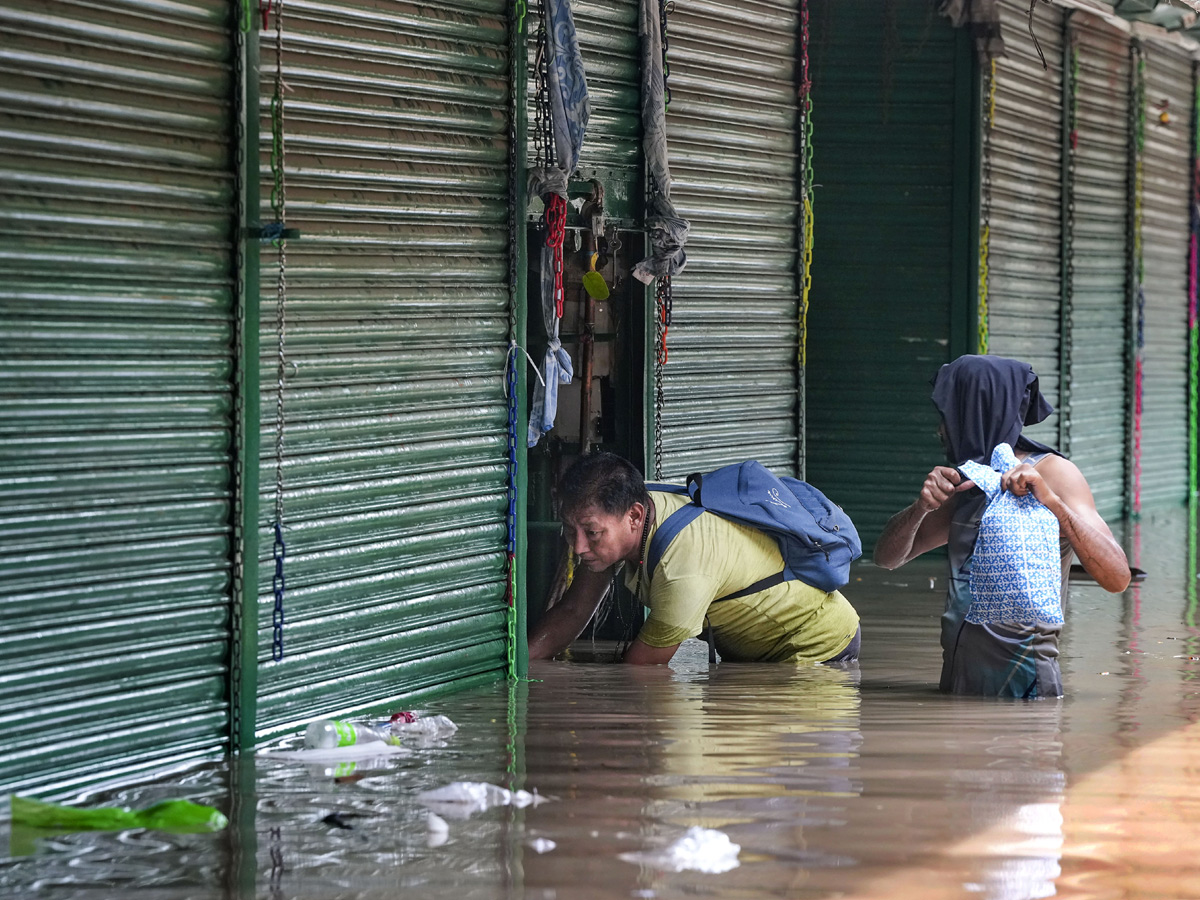 Yamuna Breaches Danger Level Waterlogging in Parts of Delhi Photos - Sakshi19