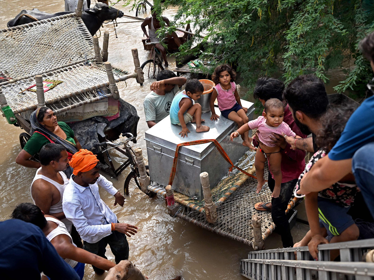 Yamuna Breaches Danger Level Waterlogging in Parts of Delhi Photos - Sakshi2