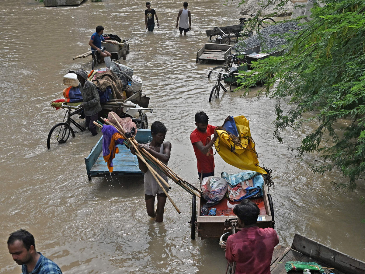 Yamuna Breaches Danger Level Waterlogging in Parts of Delhi Photos - Sakshi22