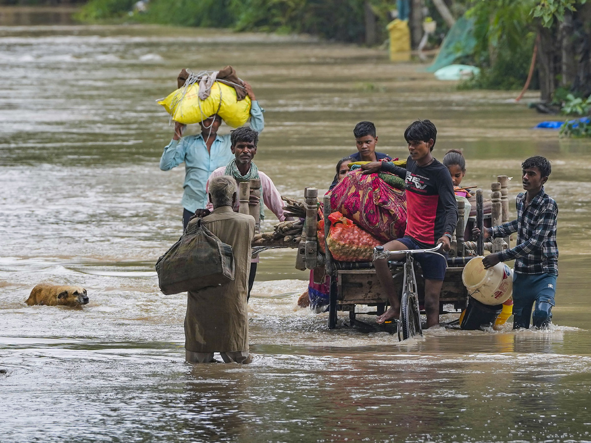 Yamuna Breaches Danger Level Waterlogging in Parts of Delhi Photos - Sakshi27