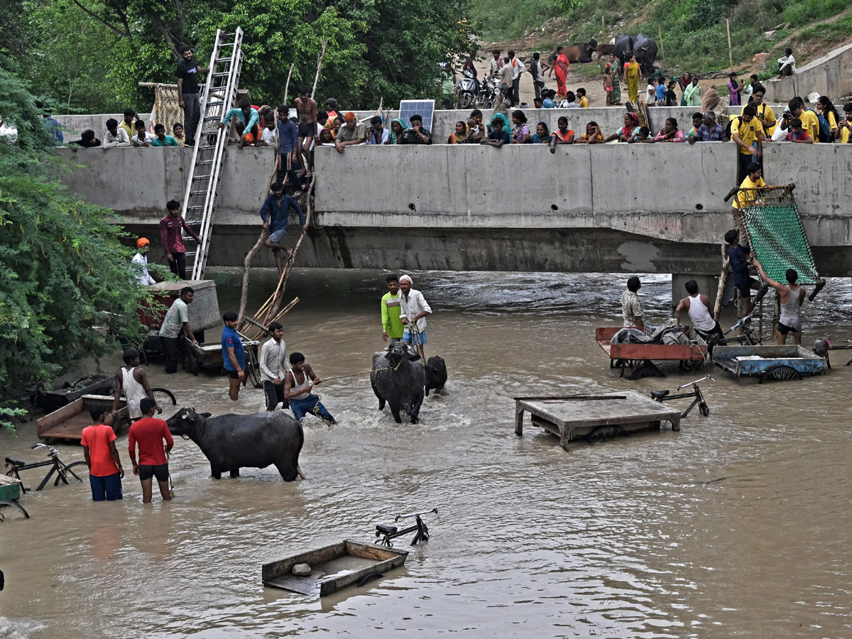 Yamuna Breaches Danger Level Waterlogging in Parts of Delhi Photos - Sakshi29