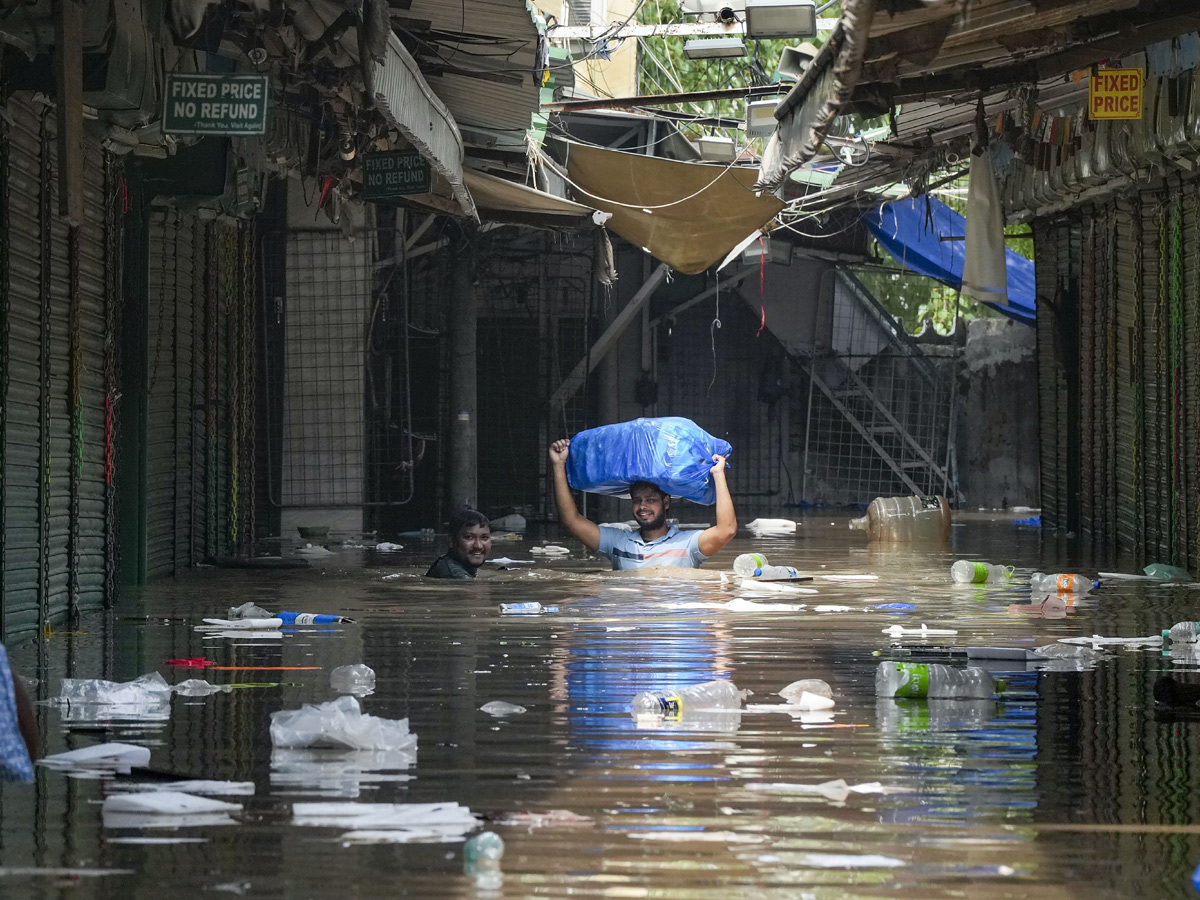 Yamuna Breaches Danger Level Waterlogging in Parts of Delhi Photos - Sakshi31