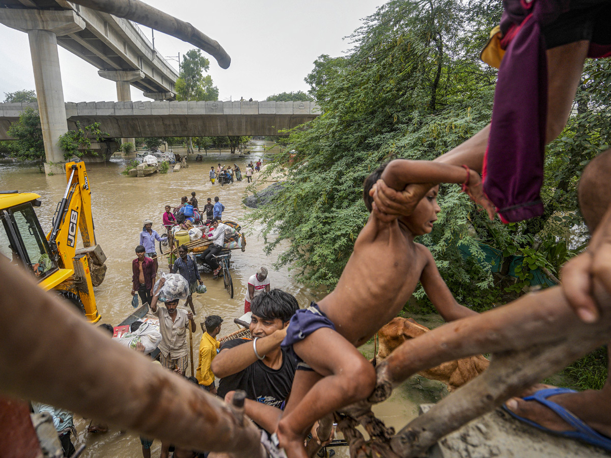 Yamuna Breaches Danger Level Waterlogging in Parts of Delhi Photos - Sakshi4