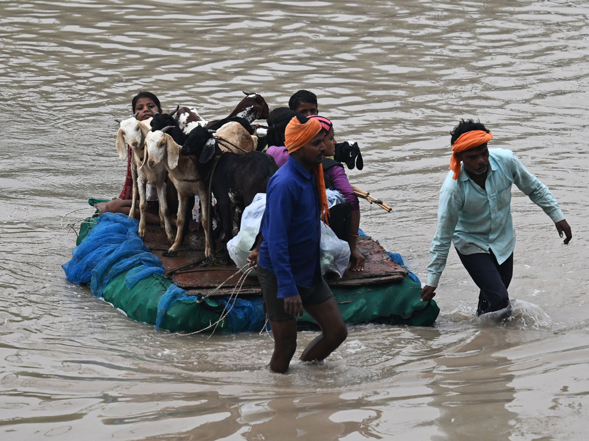 Yamuna Breaches Danger Level Waterlogging in Parts of Delhi Photos - Sakshi34