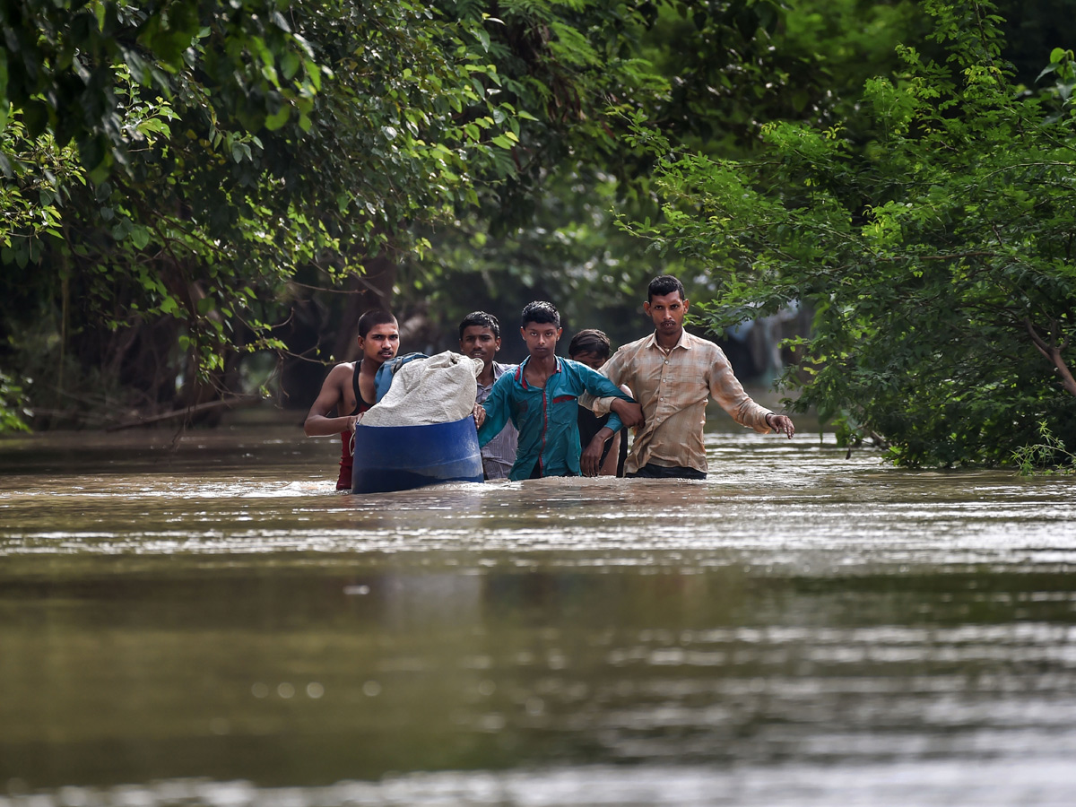 Yamuna Breaches Danger Level Waterlogging in Parts of Delhi Photos - Sakshi38