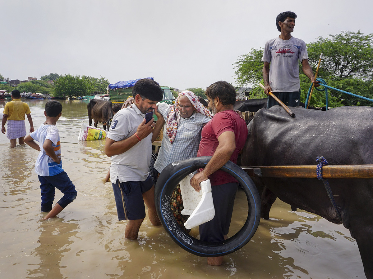 Yamuna Breaches Danger Level Waterlogging in Parts of Delhi Photos - Sakshi39