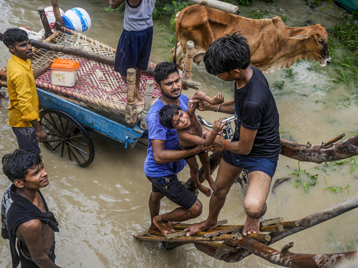 Yamuna Breaches Danger Level Waterlogging in Parts of Delhi Photos - Sakshi5