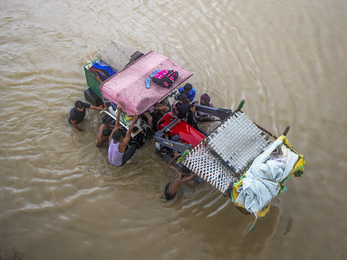 Yamuna Breaches Danger Level Waterlogging in Parts of Delhi Photos - Sakshi41