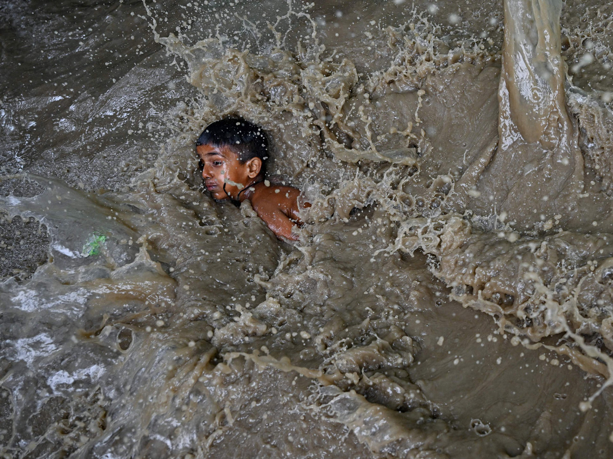 Yamuna Breaches Danger Level Waterlogging in Parts of Delhi Photos - Sakshi45