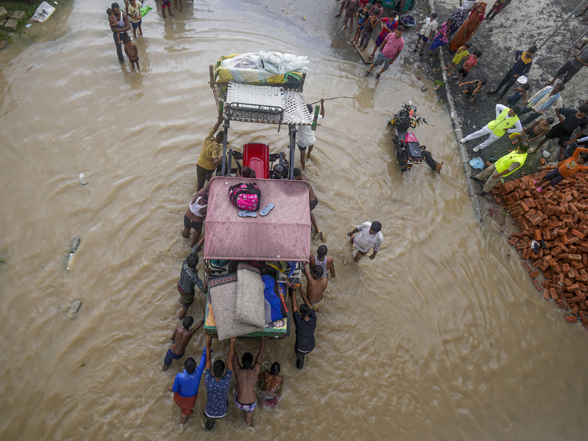 Yamuna Breaches Danger Level Waterlogging in Parts of Delhi Photos - Sakshi6