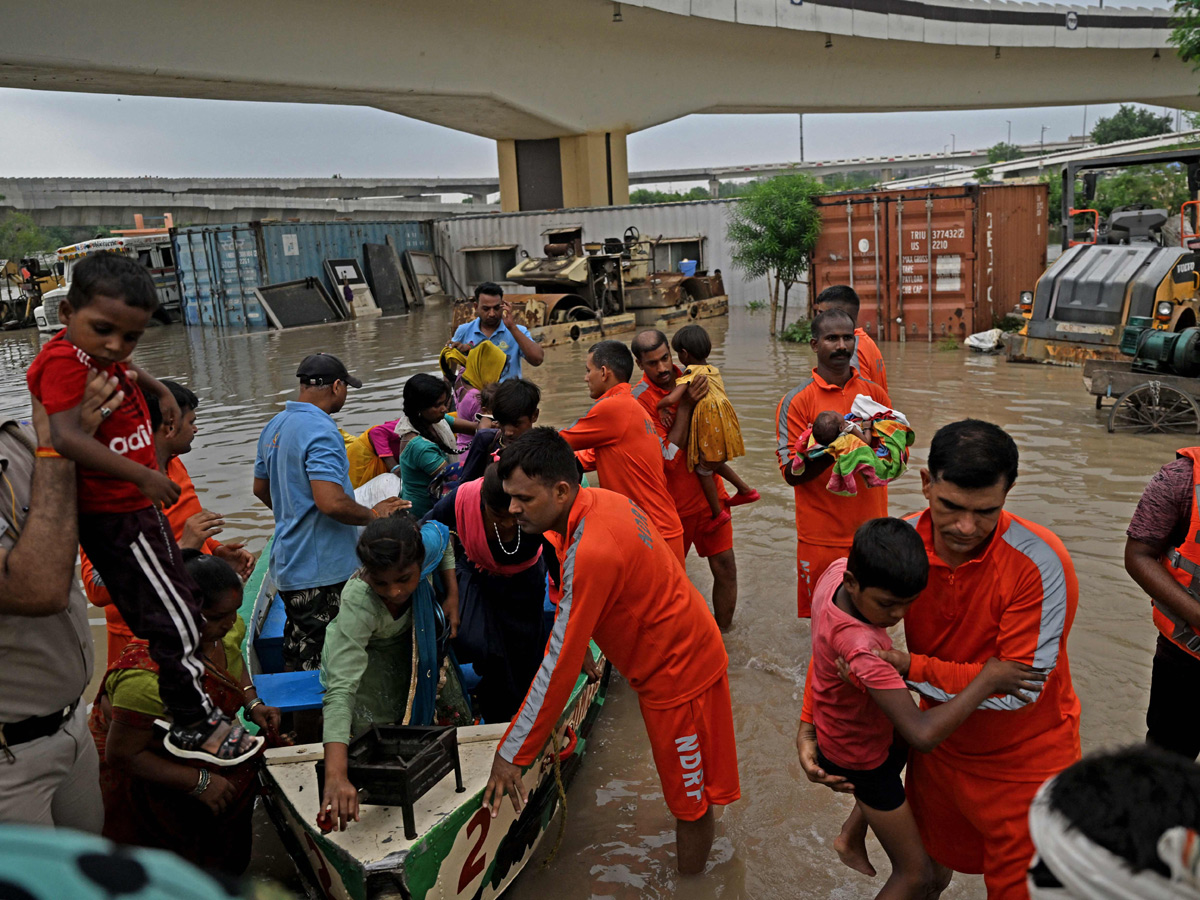 Yamuna Breaches Danger Level Waterlogging in Parts of Delhi Photos - Sakshi46