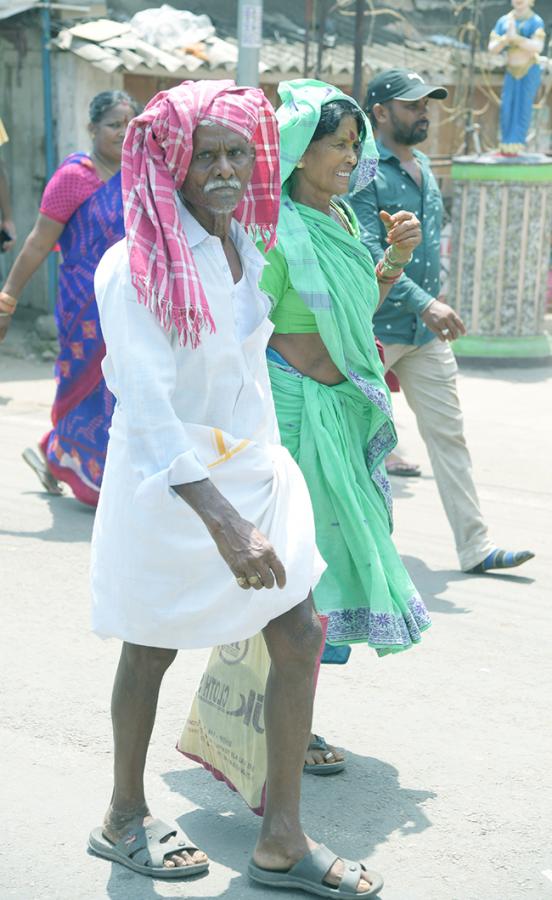 Huge Devotees take part in Simhachalam Giri Pradakshina Pics - Sakshi12