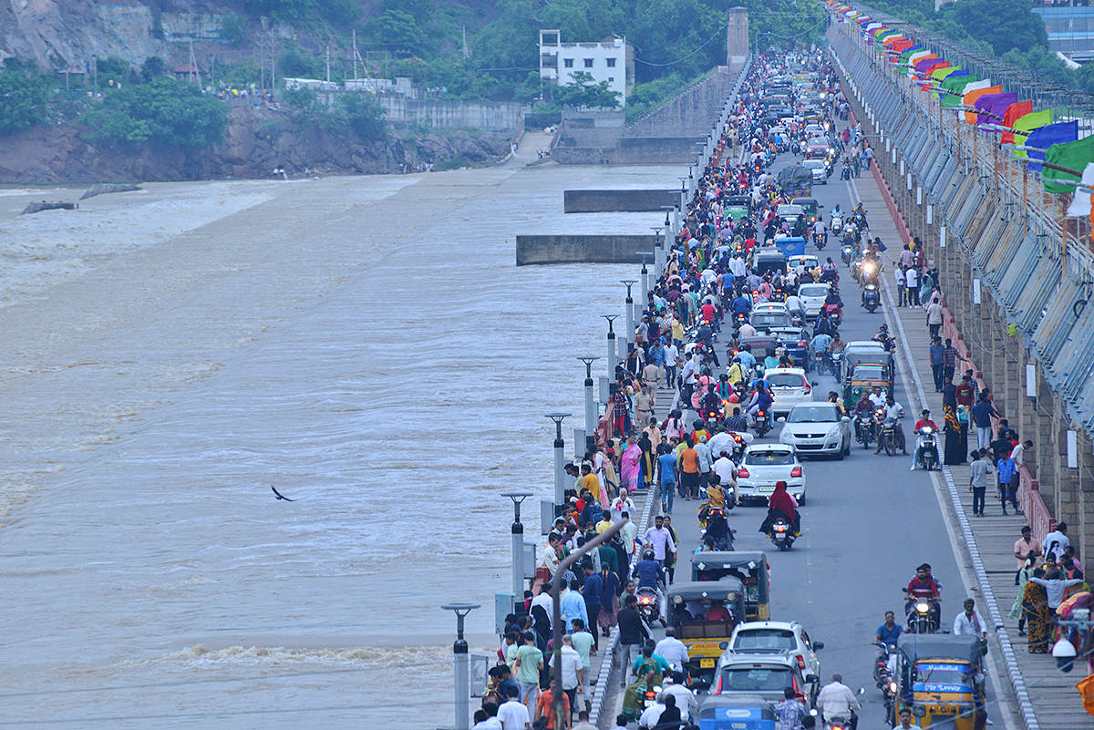 Flood Warning at Prakasam Barrage - Sakshi11