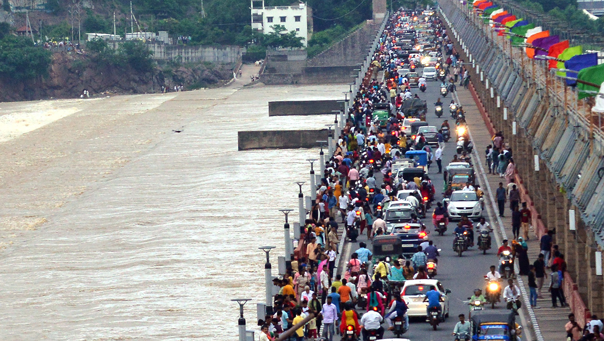 Flood Warning at Prakasam Barrage - Sakshi4