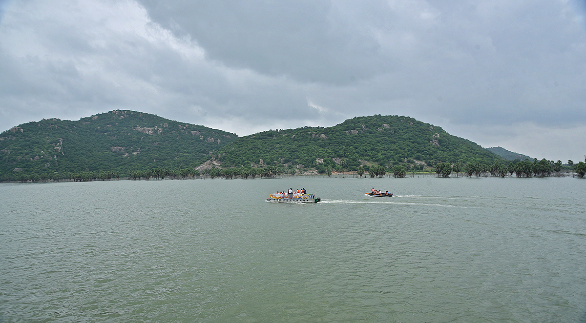 KTR Drives a Boat Launches New Boating Service in Rajanna Sircilla - Sakshi11