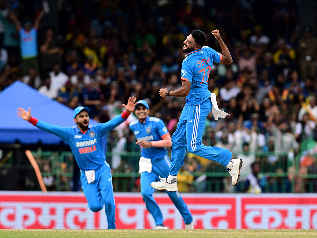 India Celebrate with the trophy after winning the Asia Cup 2023 - Sakshi20