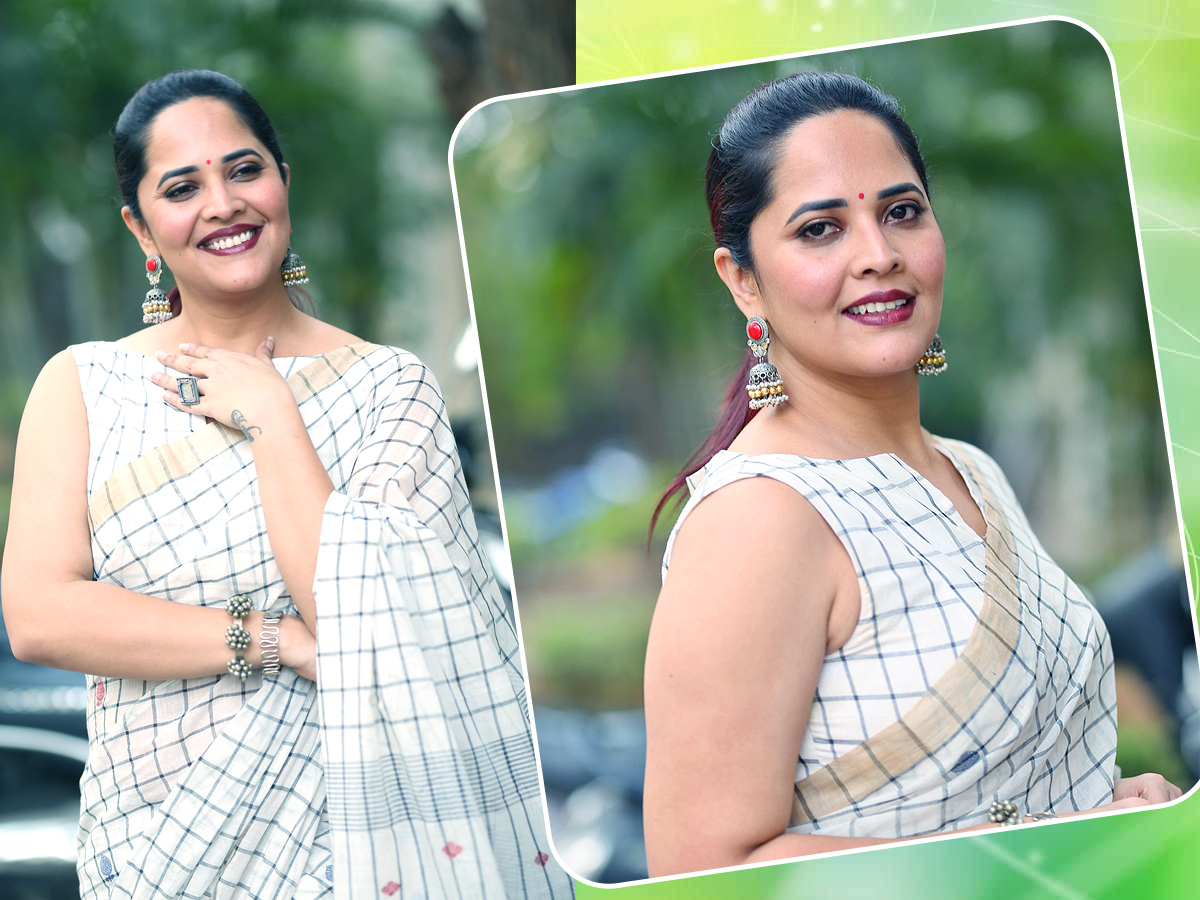 Anchor Anasuya Stunning Looks In White Saree - Sakshi1