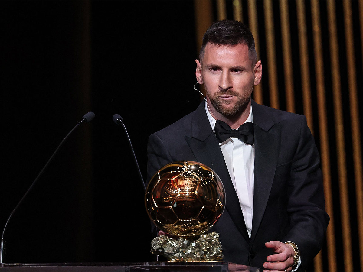 Lionel Messi poses prior to the 2023 Ballon dOr France Football award ceremony - Sakshi13