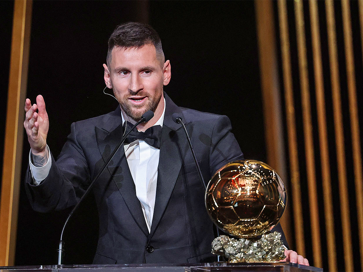 Lionel Messi poses prior to the 2023 Ballon dOr France Football award ceremony - Sakshi15