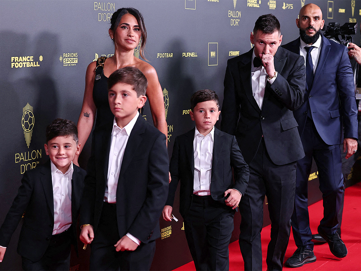 Lionel Messi poses prior to the 2023 Ballon dOr France Football award ceremony - Sakshi3