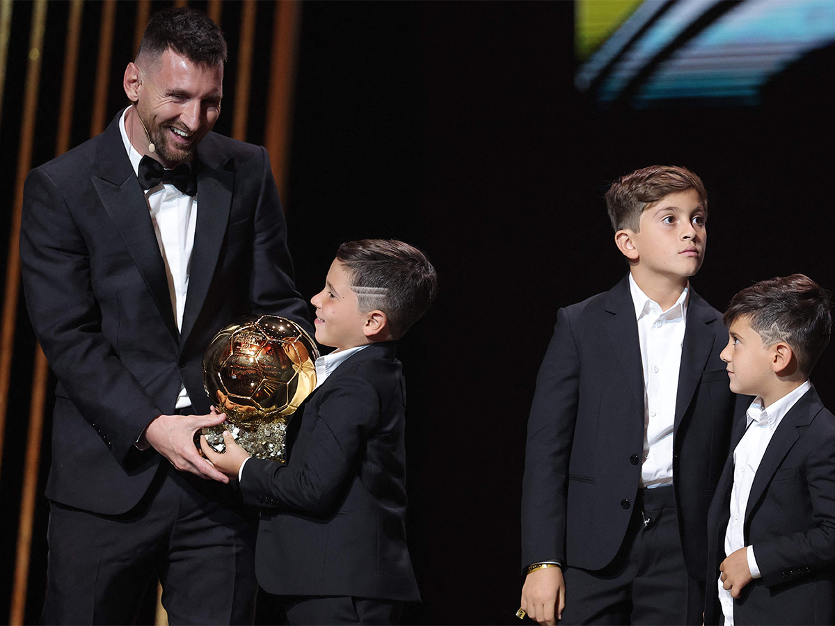 Lionel Messi poses prior to the 2023 Ballon dOr France Football award ceremony - Sakshi5