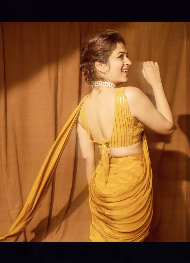 Shraddha Das Glamorous Look In A Mustard Saree  - Sakshi4