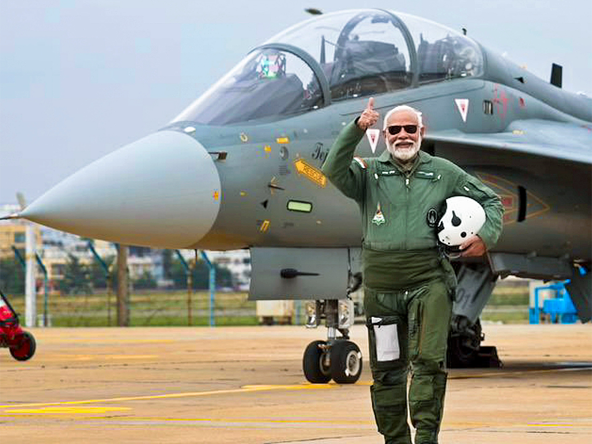 Narendra Modi during taking a sortie on the Tejas in Bengaluru - Sakshi4