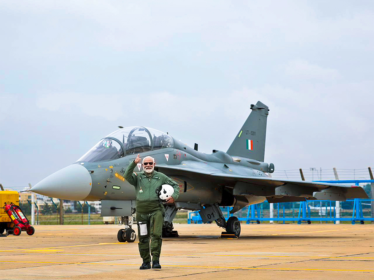 Narendra Modi during taking a sortie on the Tejas in Bengaluru - Sakshi5