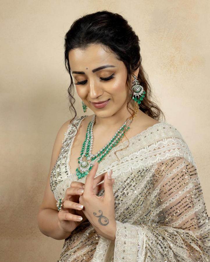 Trisha Krishnan Look Absolutely Stunning In Half White Saree - Sakshi5