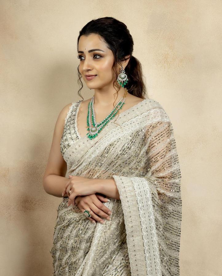 Trisha Krishnan Look Absolutely Stunning In Half White Saree - Sakshi2