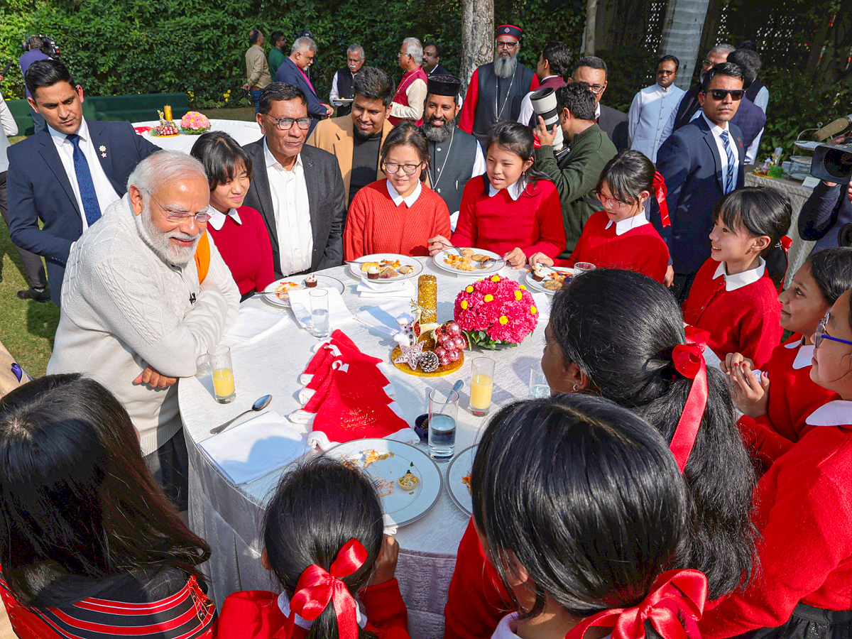 PM Modi hosts Christmas event Photos - Sakshi13