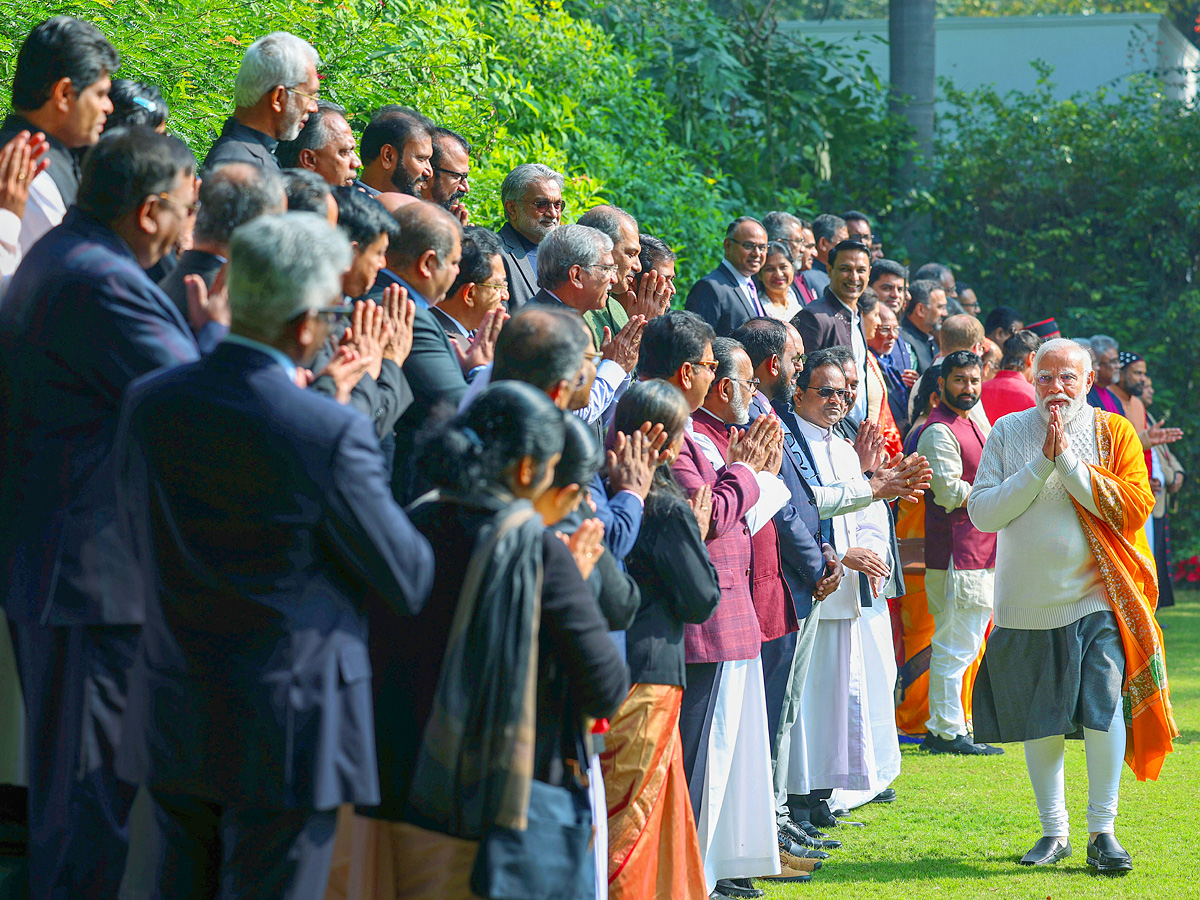 PM Modi hosts Christmas event Photos - Sakshi5