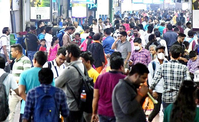 Huge Crowd At Bus Stand And Railway Stations Photos - Sakshi18