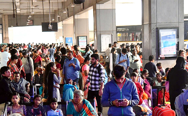 Huge Crowd At Bus Stand And Railway Stations Photos - Sakshi10