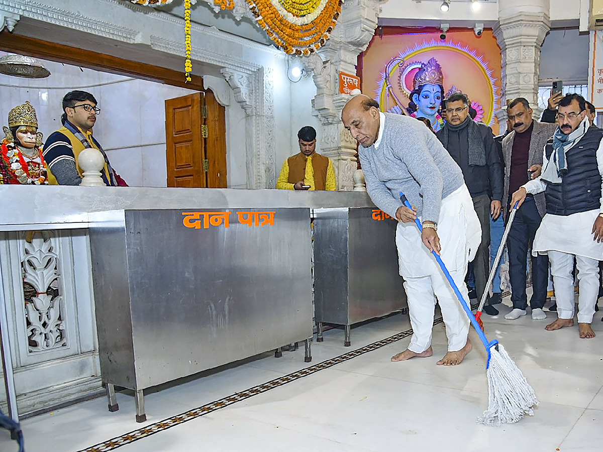 Officials take part in temple cleaning drive across the country Photos - Sakshi11