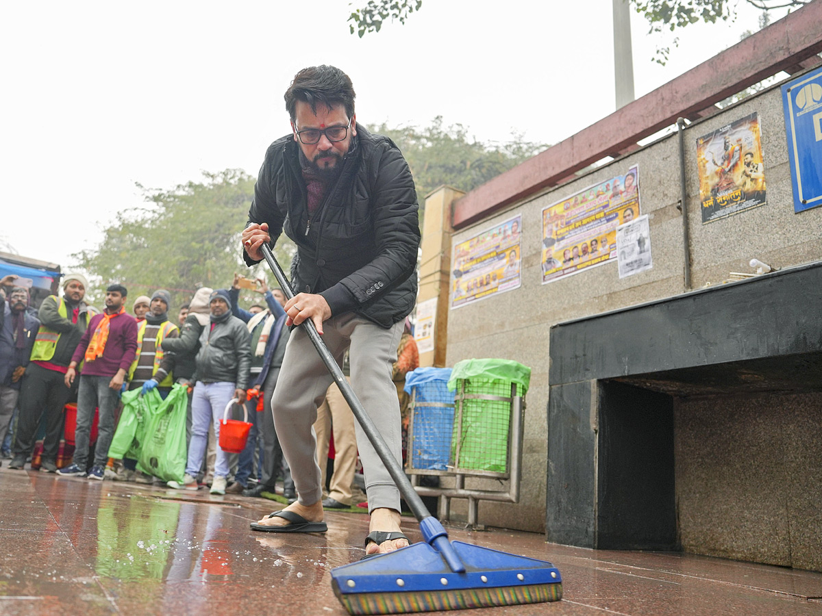 Officials take part in temple cleaning drive across the country Photos - Sakshi8