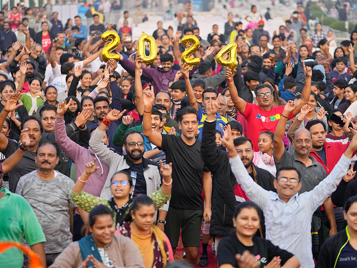 People Celebrated New Year 2024 In Their Unique Way - Sakshi2