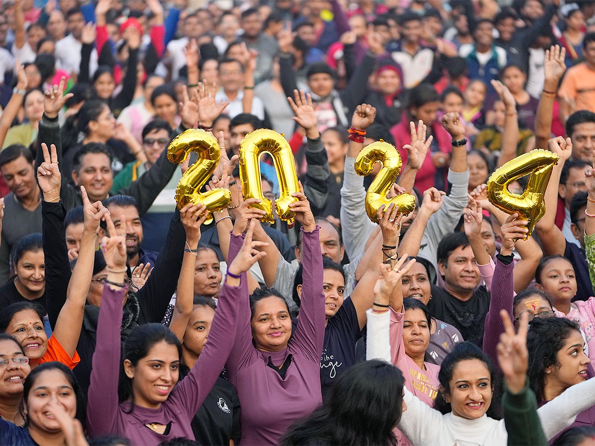 People Celebrated New Year 2024 In Their Unique Way - Sakshi4