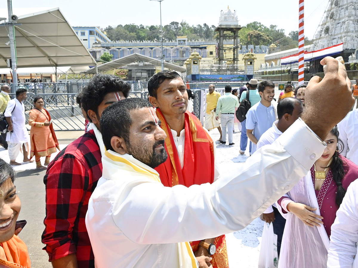 Cricketer Navdeep Saini visits Tirumala With His Wife Photos - Sakshi13