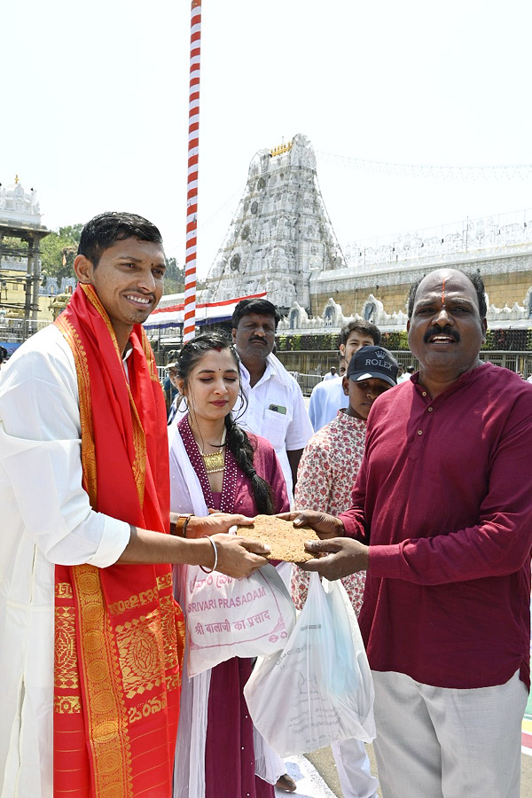 Cricketer Navdeep Saini visits Tirumala With His Wife Photos - Sakshi14