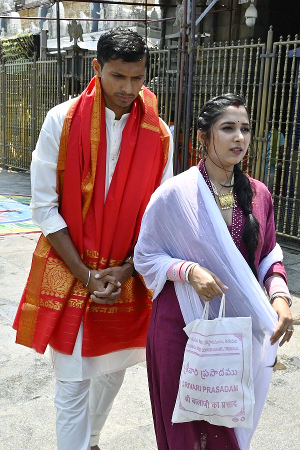 Cricketer Navdeep Saini visits Tirumala With His Wife Photos - Sakshi6