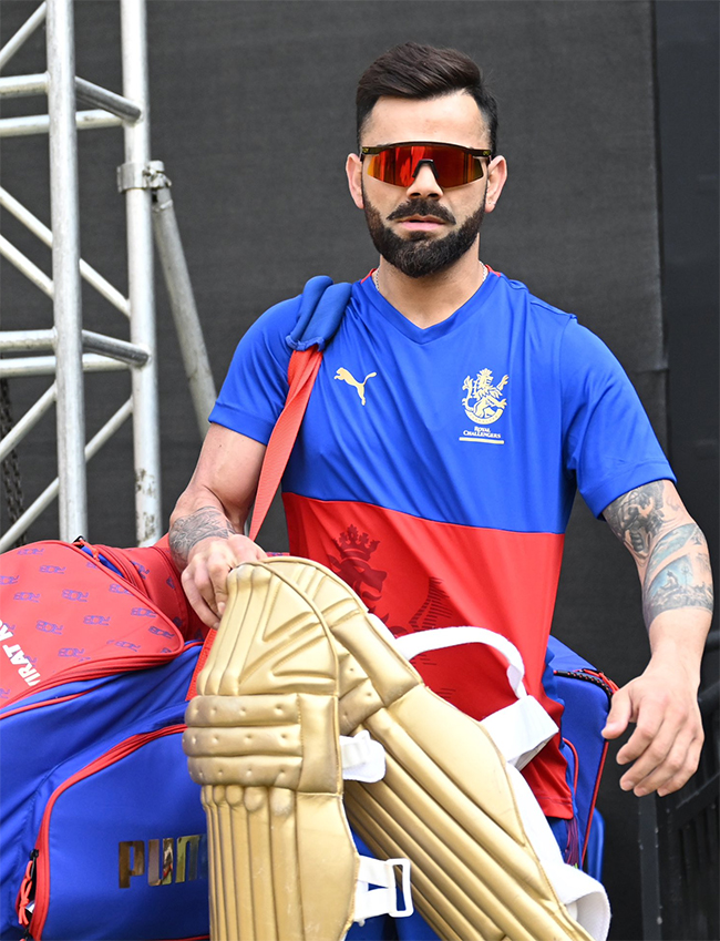 Virat Kohli during a training session ahead of the Indian Premier League - Sakshi10