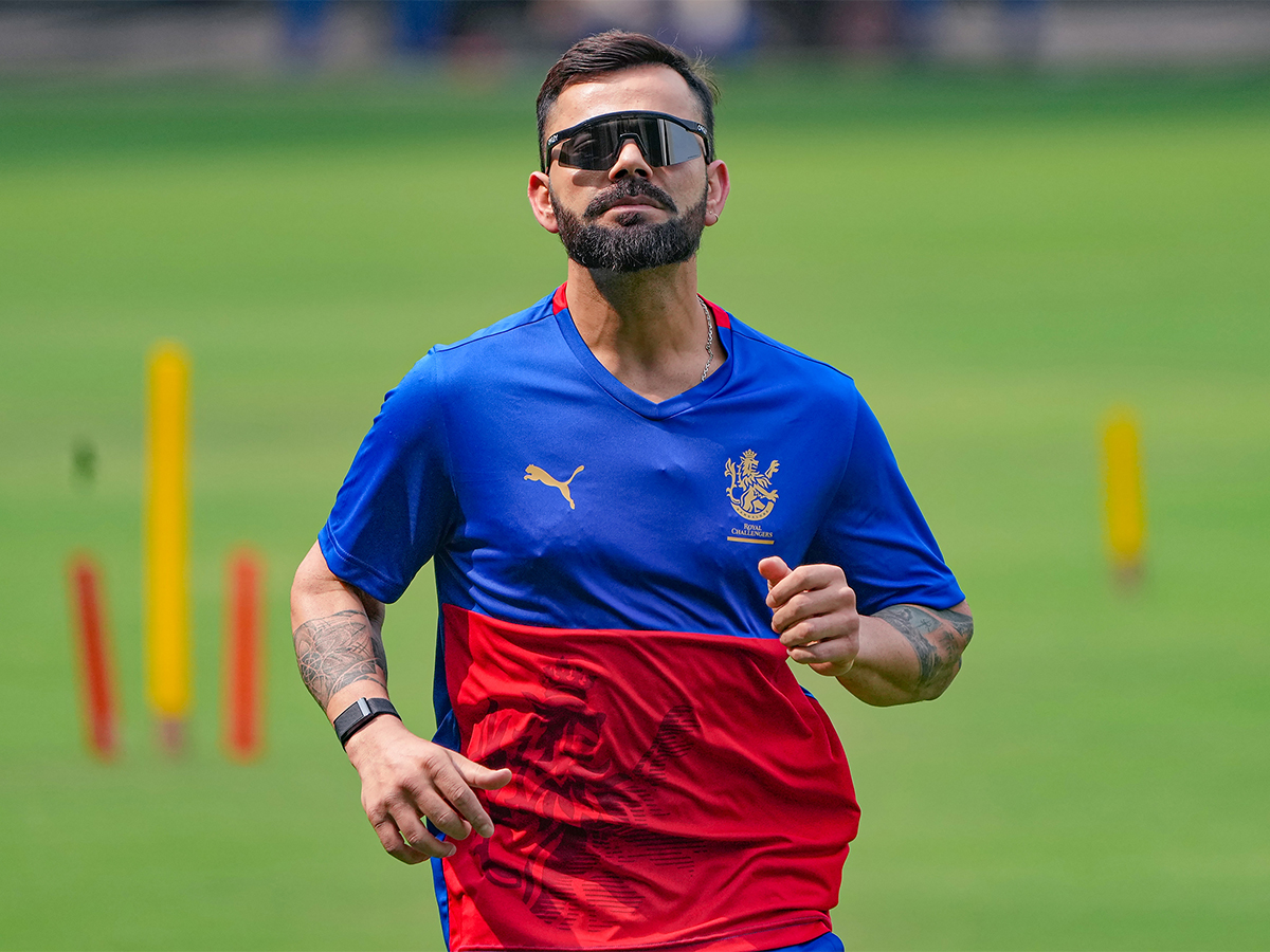 Virat Kohli during a training session ahead of the Indian Premier League - Sakshi16